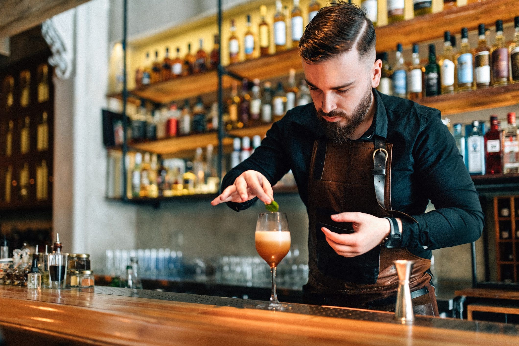 Bartender preparing cocktails